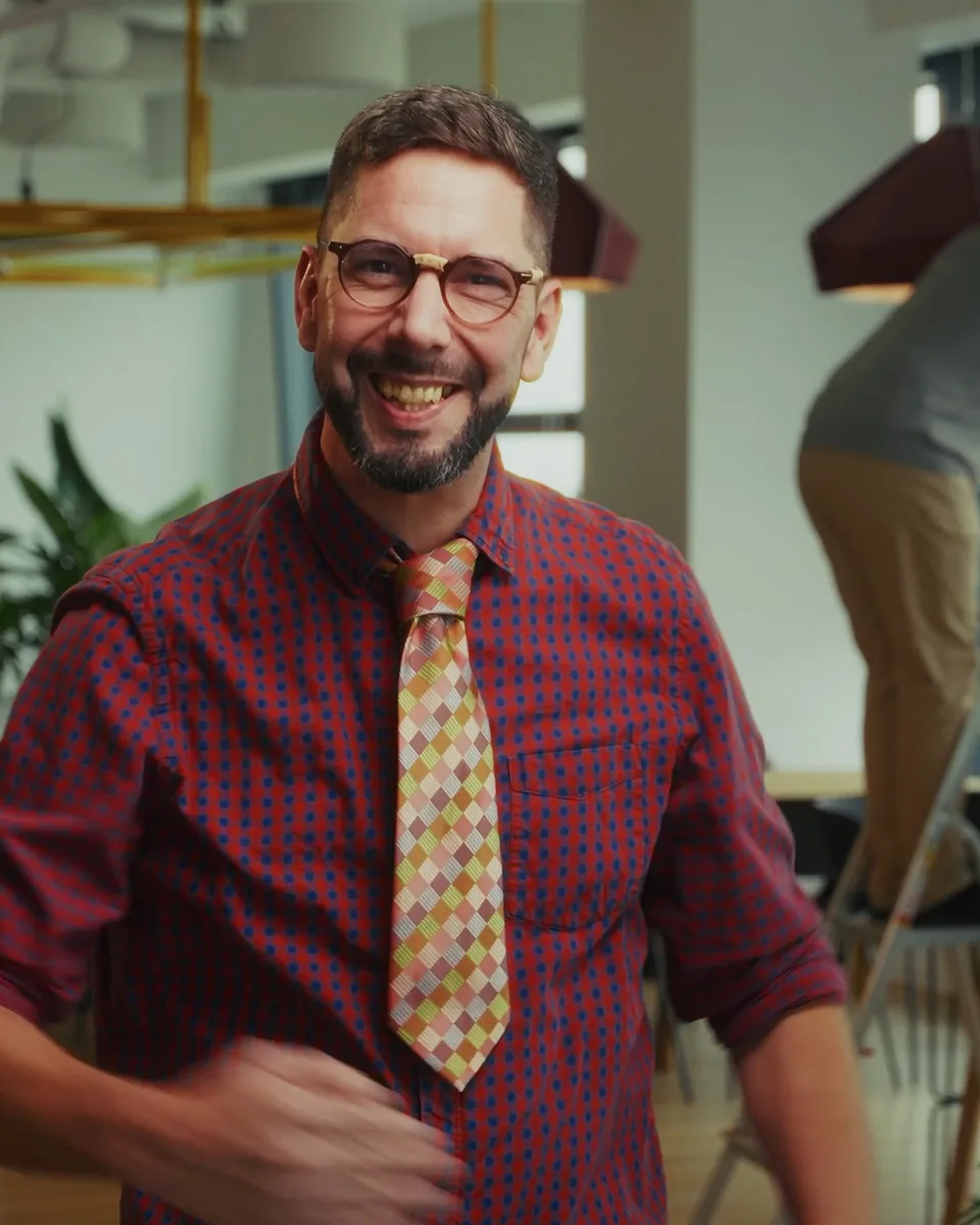 Smiling recruiter in the GoHealth commercial